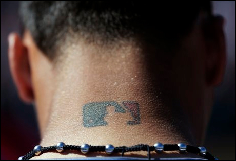 MLB sues Baez for trademark infringement after seeing its logo tattooed on  his neck